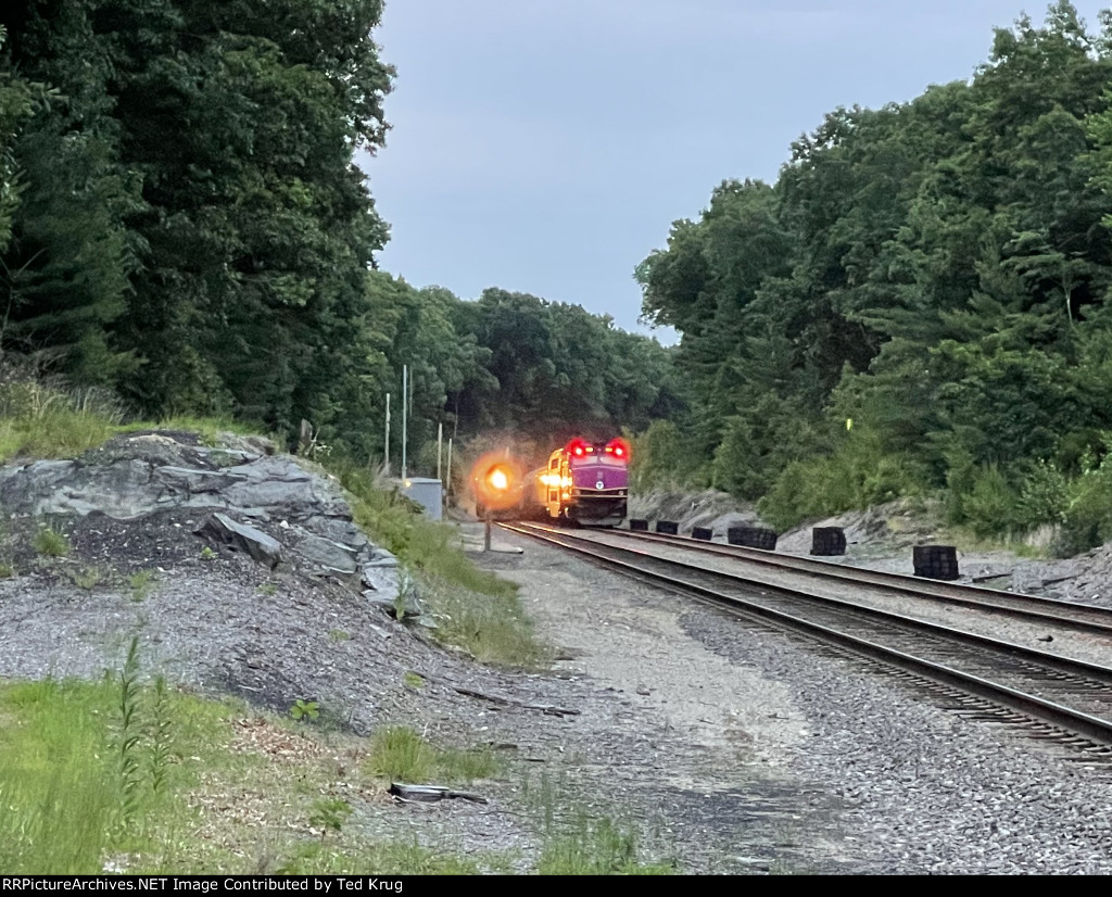 MBTA 1063 passing MBTA 1121